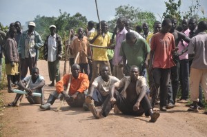 some-of-the-residents-sitting-in-the-middle-of-roading-forbiding-cars-form-using-the-road